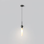 A studio shot of a single black marble Clérachic pendant light on a grey background, cropped lower than the matching shot.