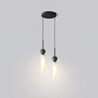A studio shot of a two-head Clérachic pendant light with a black canopy, its two cylinder shades hanging at different heights.