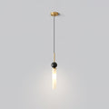 A studio shot of a single-head Clérachic pendant light with a brass canopy and stem, its marble ball and frosted shade lit.