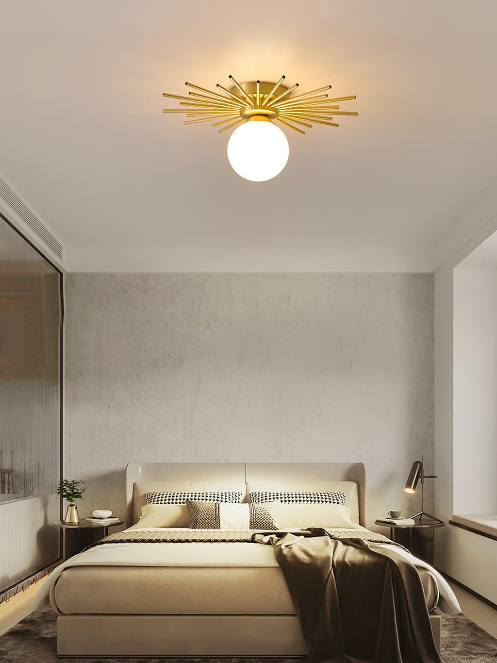 A mirrored wardrobe and layered throws sit beneath this Clérachic ceiling light, glowing warm in the bedroom.
