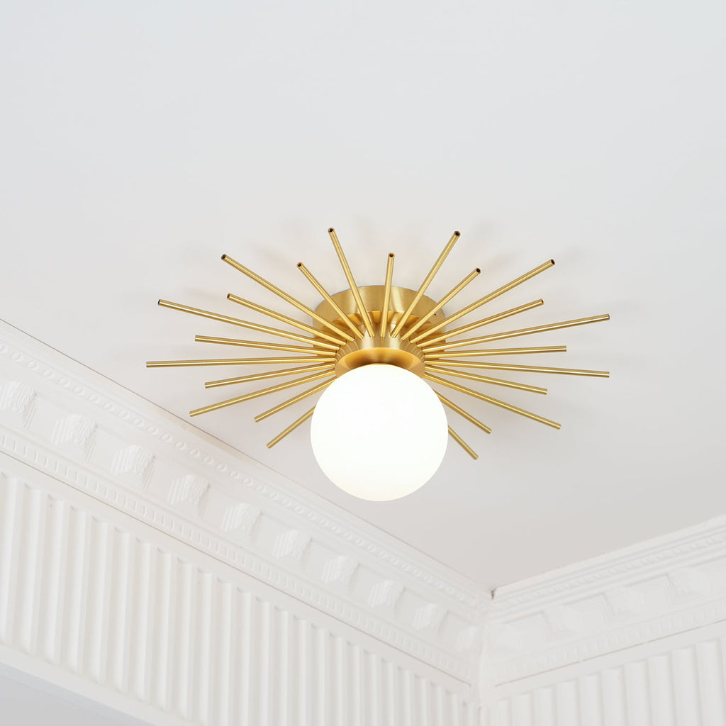 A higher-angle view shows this Clérachic ceiling light near a corner where crown moulding meets the ceiling.