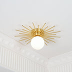 A higher-angle view shows this Clérachic ceiling light near a corner where crown moulding meets the ceiling.