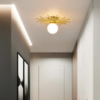 A warm LED strip lines this hallway, where this Clérachic ceiling light adds its own soft glow overhead.