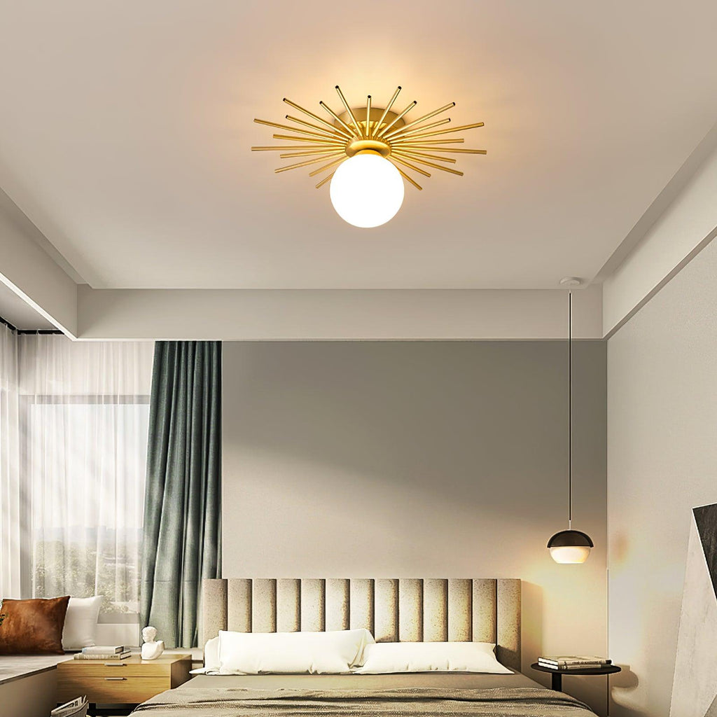 Above a bedroom hung with a woven wall piece and sheer curtains, this Clérachic ceiling light glows warm.