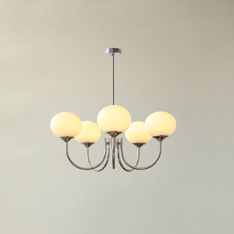 Marshmallow chandelier hanging over a dining setting