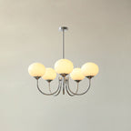 Marshmallow chandelier hanging over a dining setting
