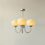 Marshmallow chandelier hanging in a bright styled interior