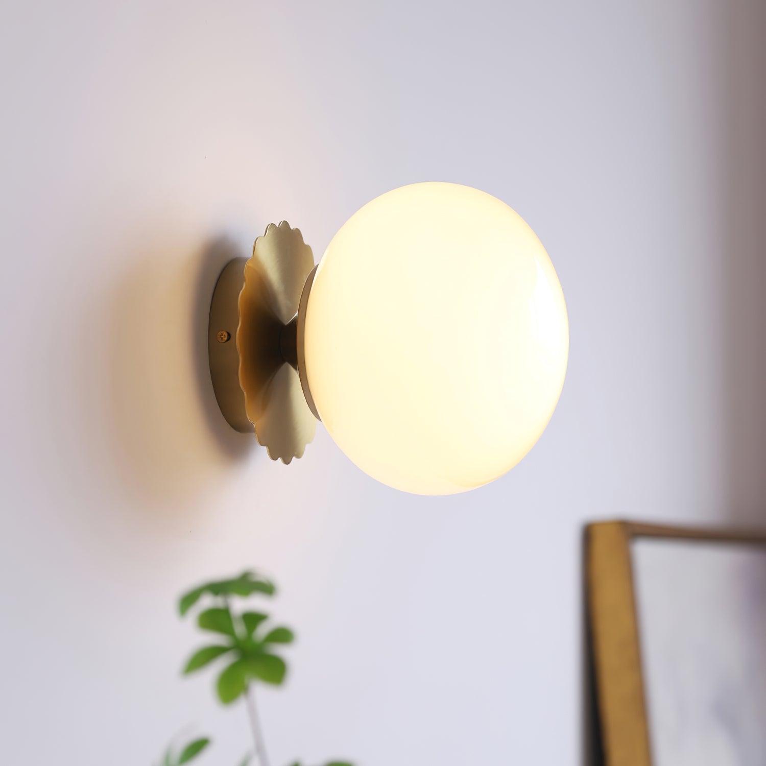Glass-diffuser wall sconce casting soft ambient light