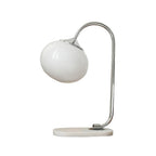 Clérachic pastel glass table lamp with a white glass shade on a chrome arm and marble base, photographed unlit against plain white.