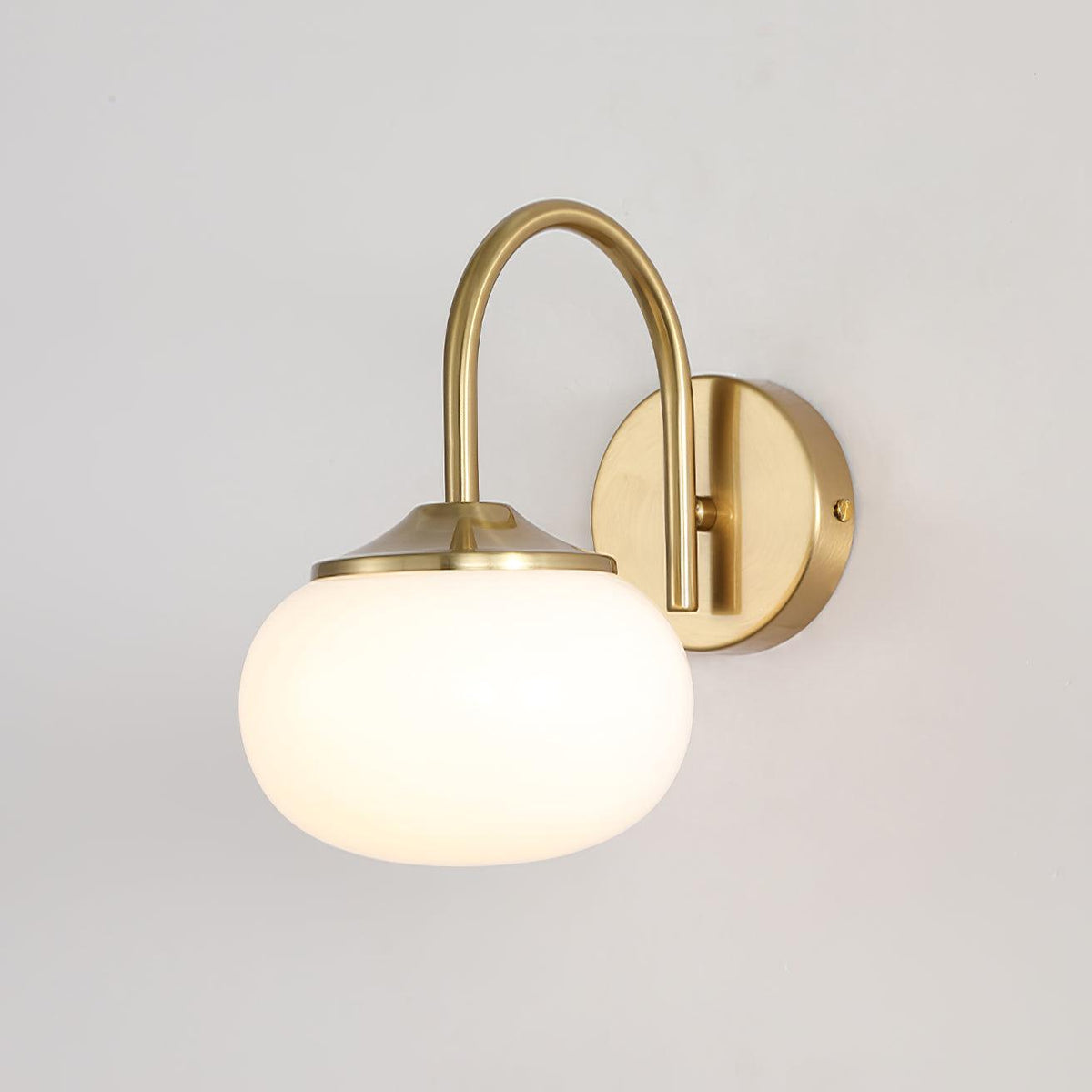 Straight-on view of this Clérachic wall light in copper and white glass, unlit, on white.