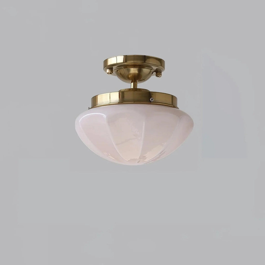 Compact Art Deco ceiling pendant with rounded glass shade