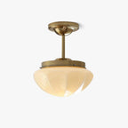 Art Deco mini ceiling light with warm light through glass
