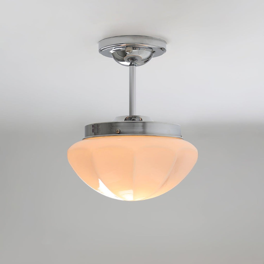 Art Deco pendant light with glass shade in a small room