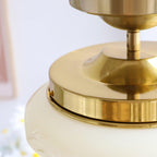 Marta pendant light with glass shade and slim metal frame