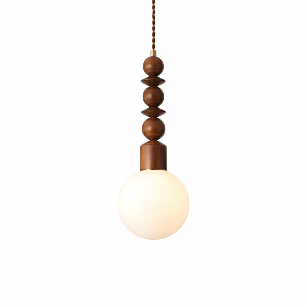 Ash wood pendant light with walnut hardware glowing softly