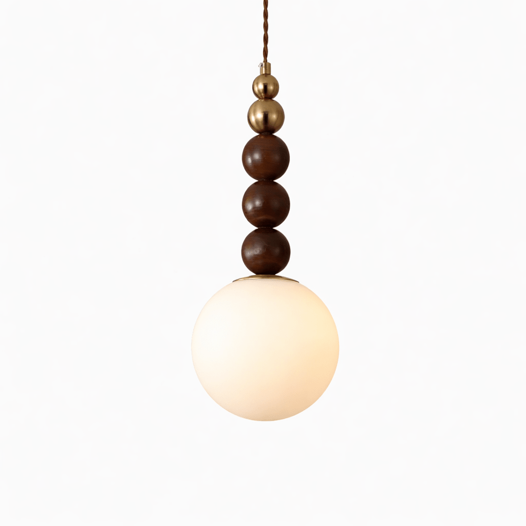 Wood-bead pendant light shown lit against a pale wall