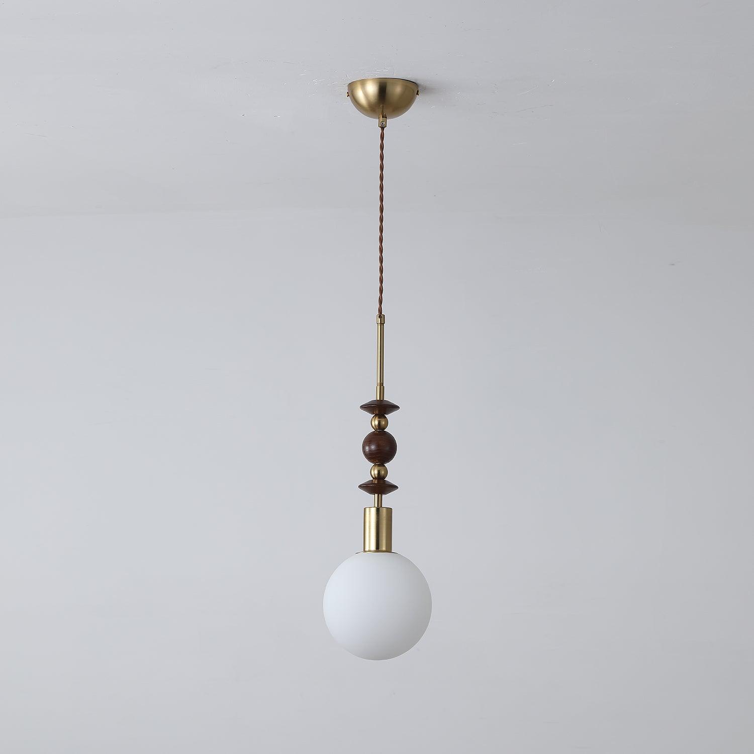 Wood-bead pendant light with glass shade and slim cable