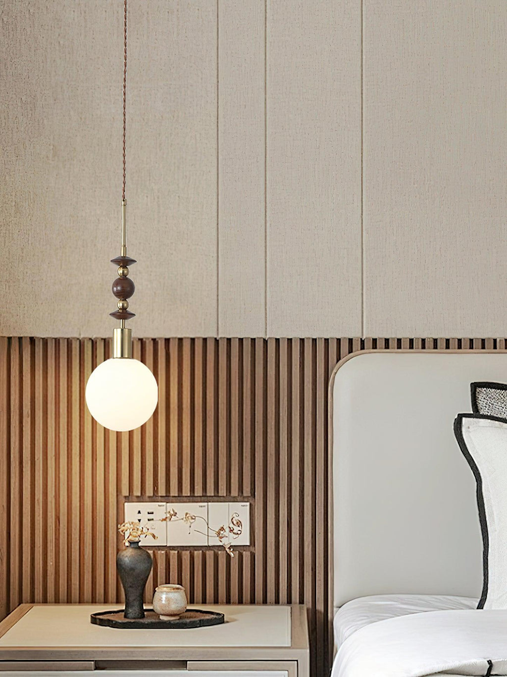 Ash wood bead pendant light shown in a cosy interior