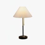 Clérachic pleated-shade table lamp shown unlit and upright against a plain white backdrop.