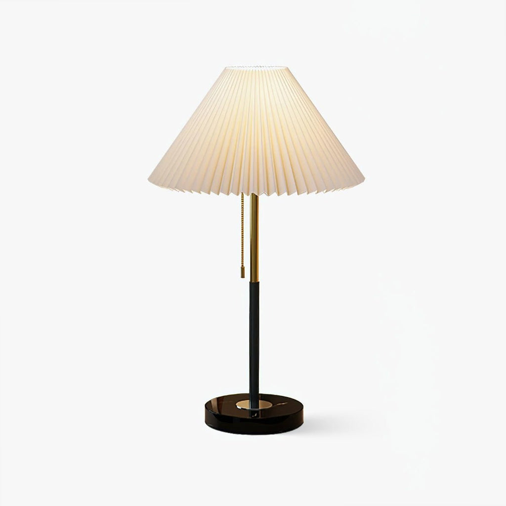 Clérachic pleated-shade table lamp with a black stem and round base, shown alone against a plain white backdrop.