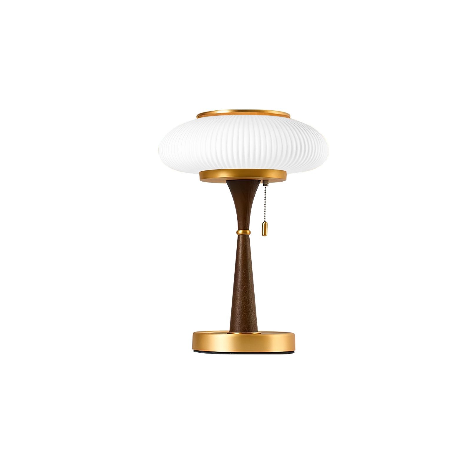 Mushroom-shade table lamp glowing warm amber on a bedside table