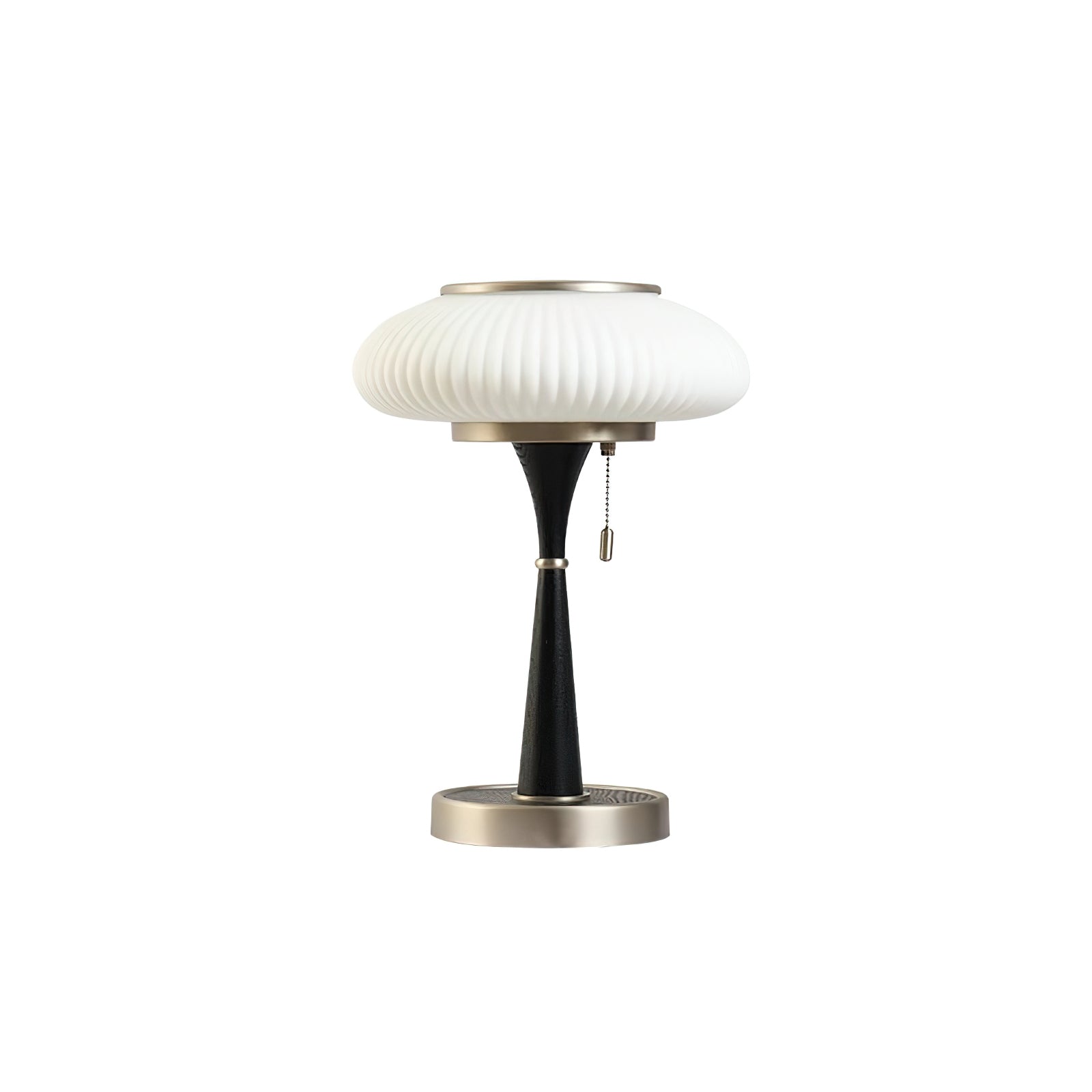Mushroom glass table lamp with metal base on a side table