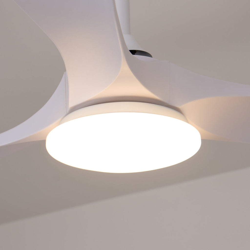 Ceiling fan light with wooden blades casting warm overhead light