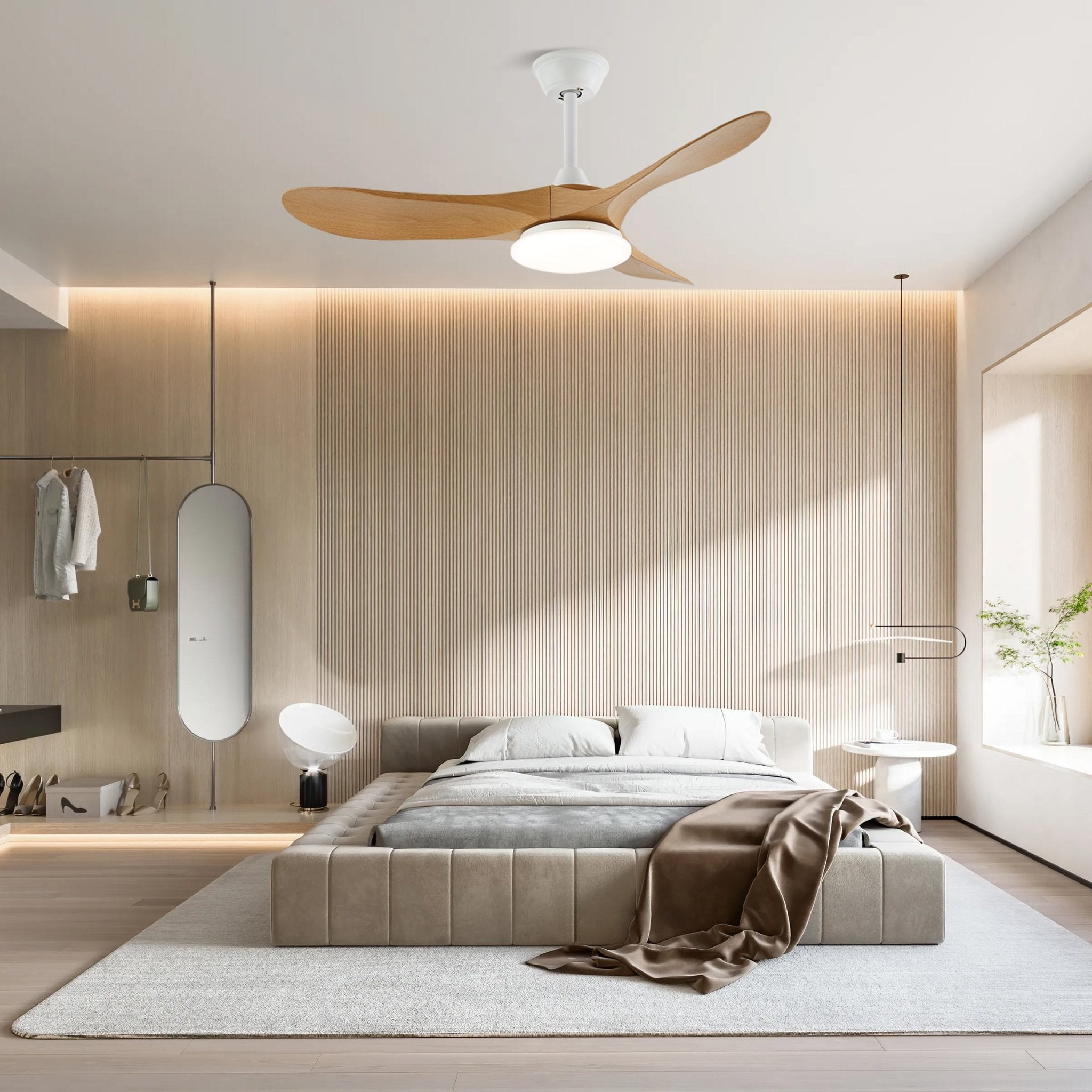 Wood-blade ceiling fan light shown lit in a modern room