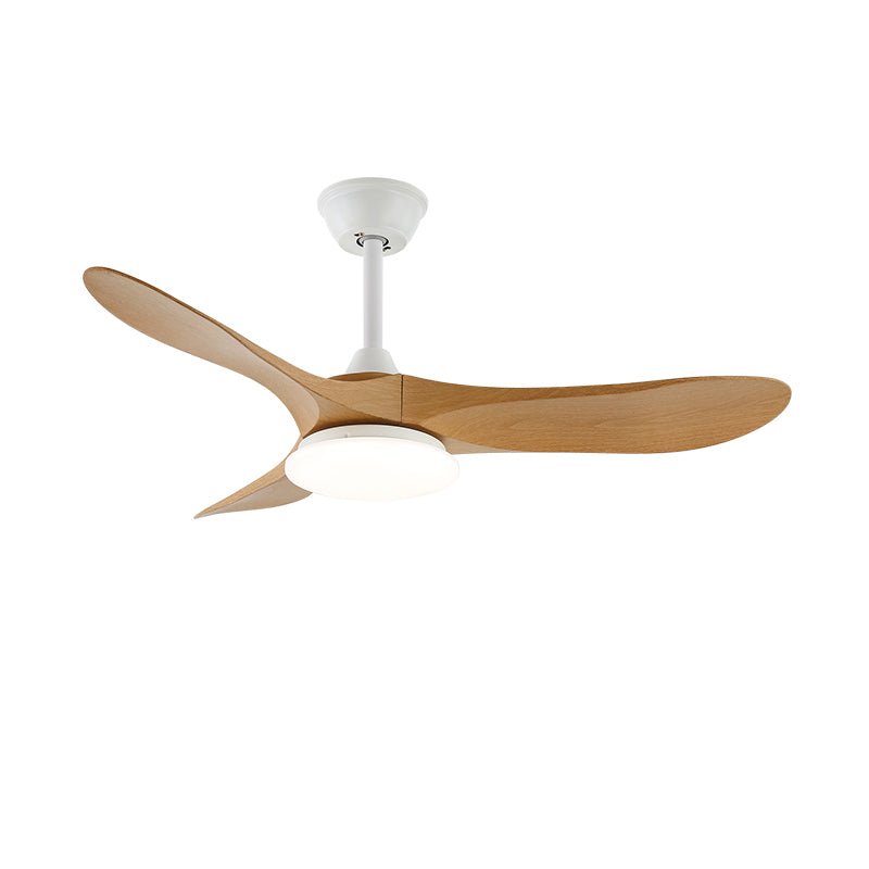 Wood-blade ceiling fan light glowing warm above a styled living space