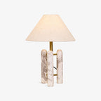 Clérachic table lamp centred on a plain light-grey background, shade and marble base shown in full.