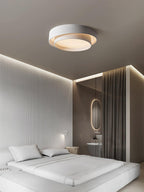 Modern cylinder ceiling light glowing in an interior