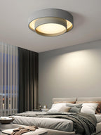 White cylinder ceiling light in a contemporary room