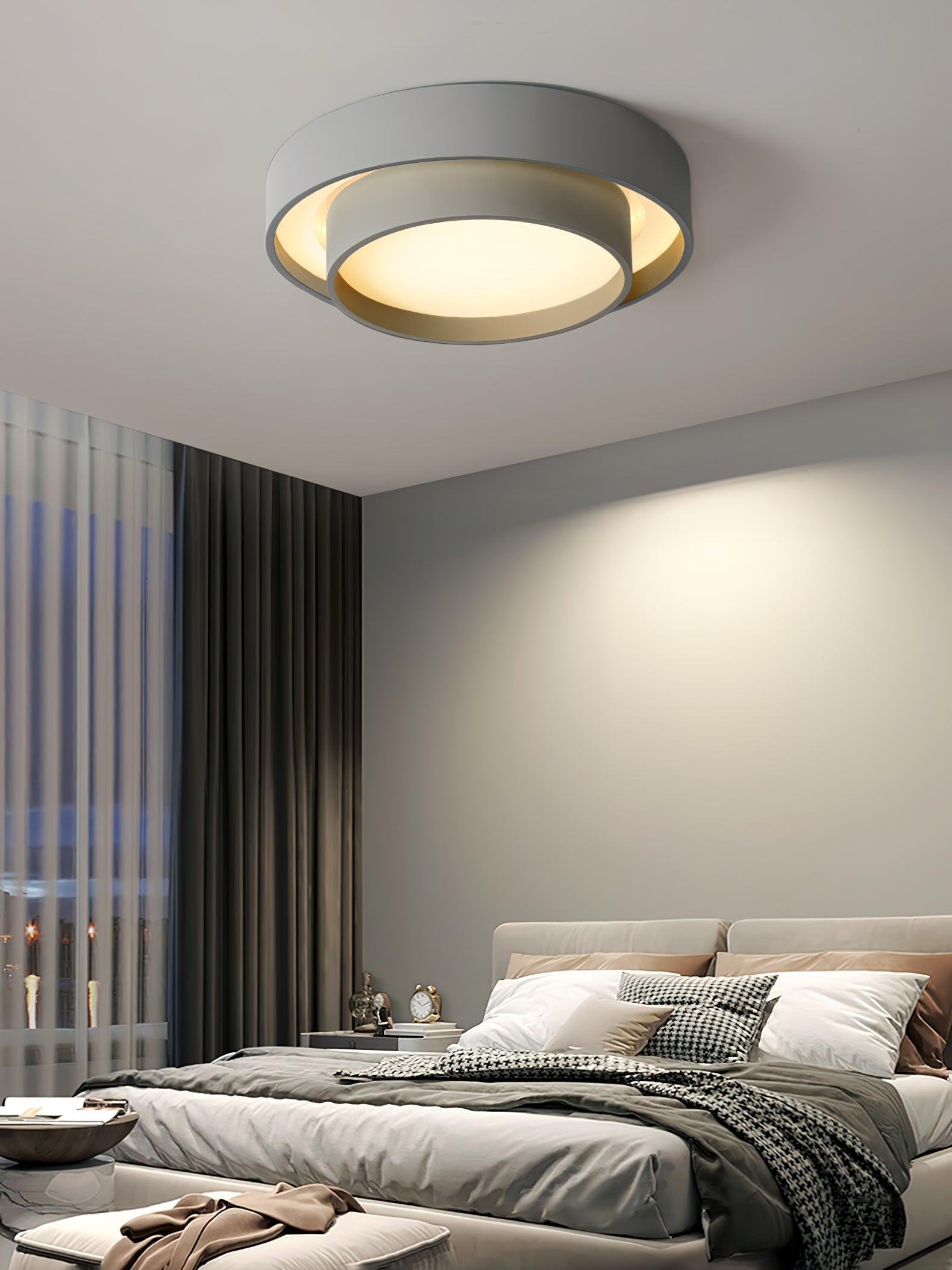 White cylinder ceiling light in a contemporary room