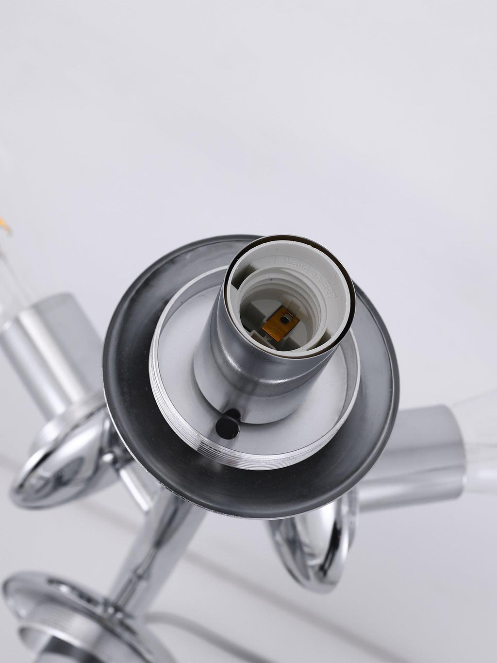 Close-up of an empty chrome E27 socket on this Clérachic floor lamp, its threaded fitting and mounting disc shown with no bulb inserted.