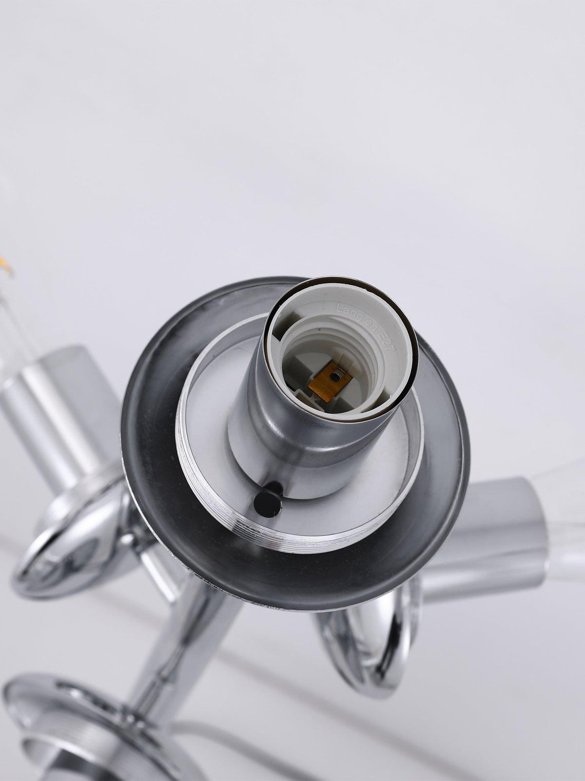 Close-up of an empty chrome E27 socket on this Clérachic floor lamp, its threaded fitting and mounting disc shown with no bulb inserted.