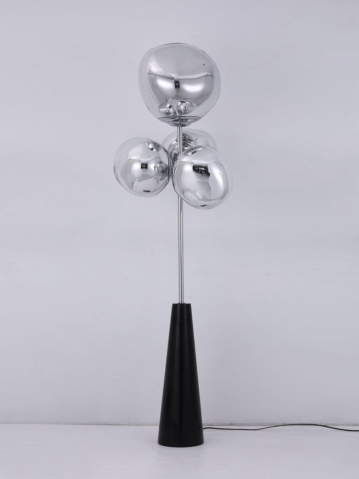 Unlit mirror-chrome glass globes catch the studio light on this Clérachic floor lamp, shown plain against a white background with its cord.