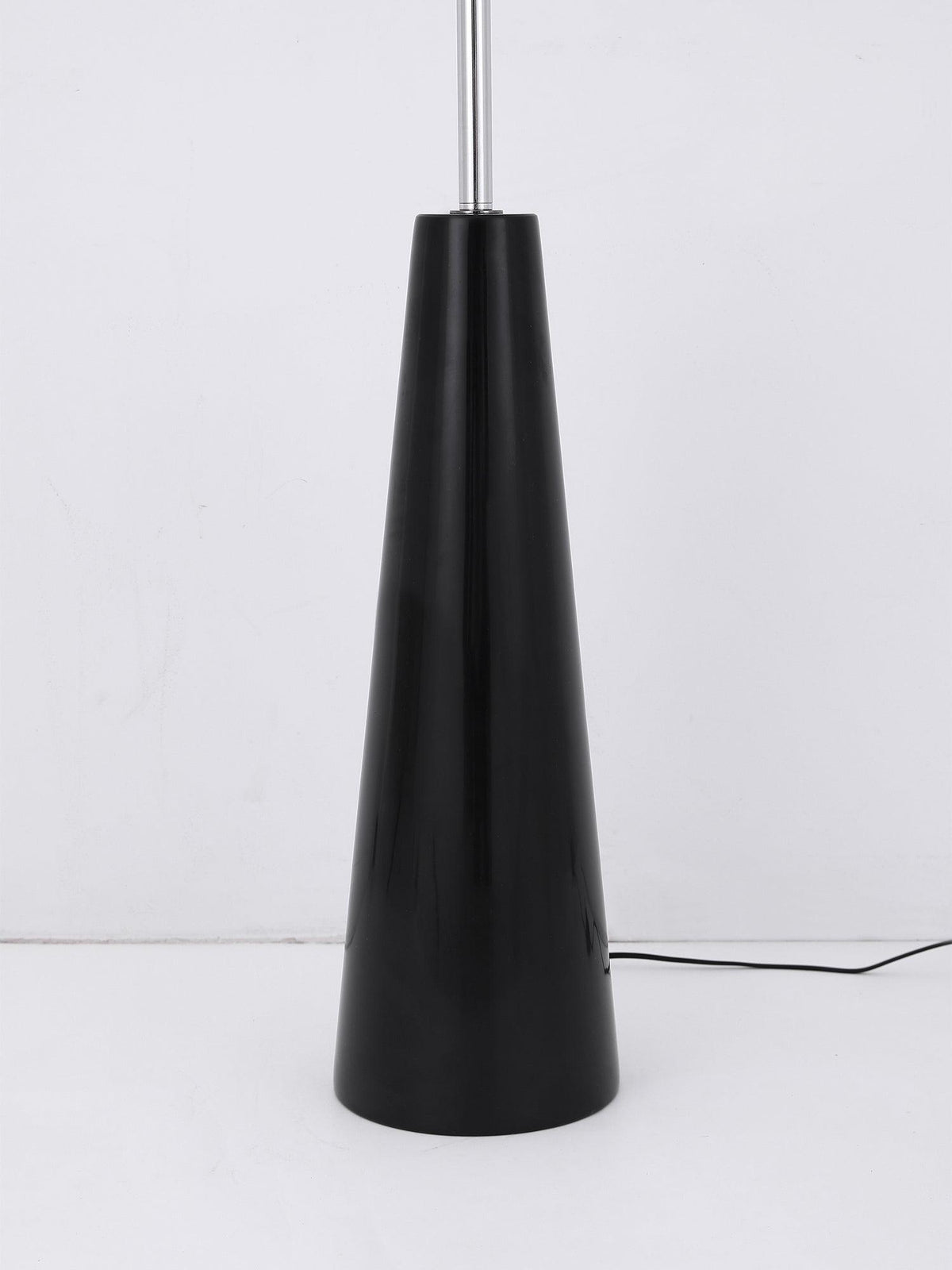 The plain black conical base of this Clérachic floor lamp shown alone, its glossy lacquered finish visible with no globes attached.