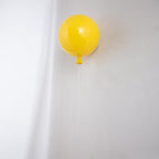 Balloon wall light with pull cord switch and warm glow