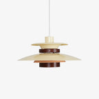 A beige Clérachic pendant with a walnut ring, unlit, on a plain grey backdrop.