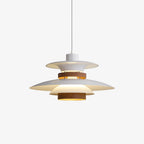 A lit white Clérachic pendant with a walnut ring, shown against a plain grey backdrop.