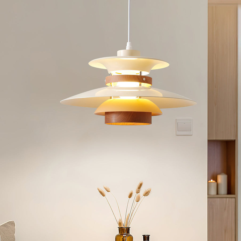 Lit beige shades and walnut rings on this Clérachic pendant against open wood shelving.