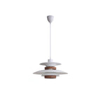 A white Clérachic pendant on a long cord, shown whole against a plain white backdrop.