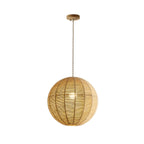 Mounted on a round wood canopy, this hemp rope Clérachic pendant hangs against a plain white backdrop.
