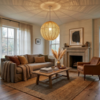 A sectional sofa and pampas grass sit near a stone mantel in a living room lit by this hemp rope Clérachic pendant.