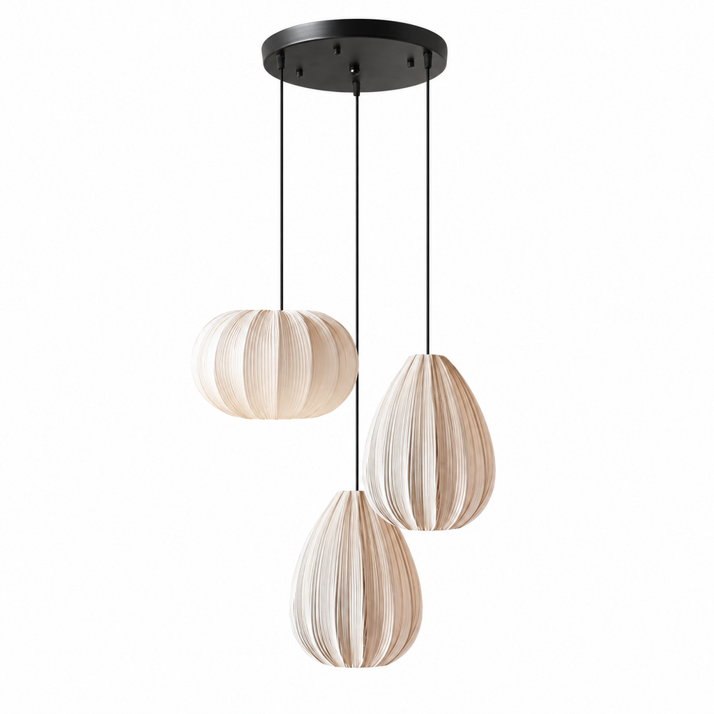 This three-head Clérachic pendant pairs a round pleated shade with two egg-shaped ones from a shared black canopy.