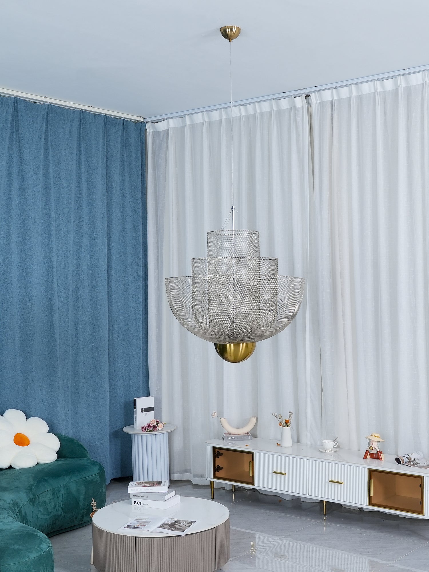 Wirework pendant light shown lit in a styled setting