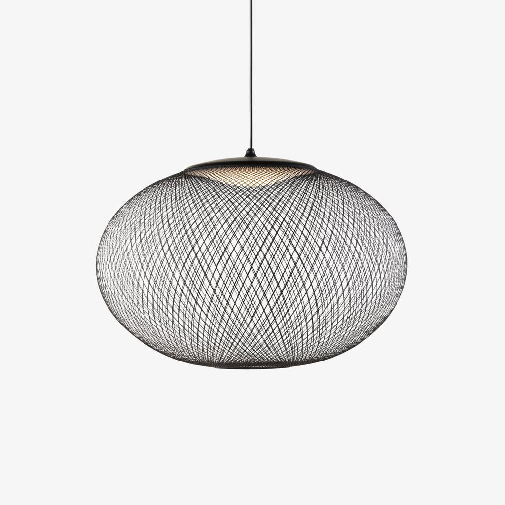 Mesh shade pendant light suspended over a table