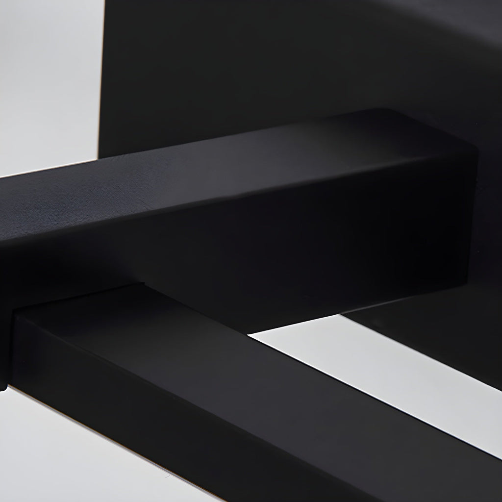 Black linear wall light shown lit in a bathroom