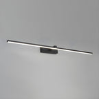 Slim black linear wall light mounted near a mirror