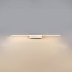 Slim linear wall light shown lit in a modern bathroom